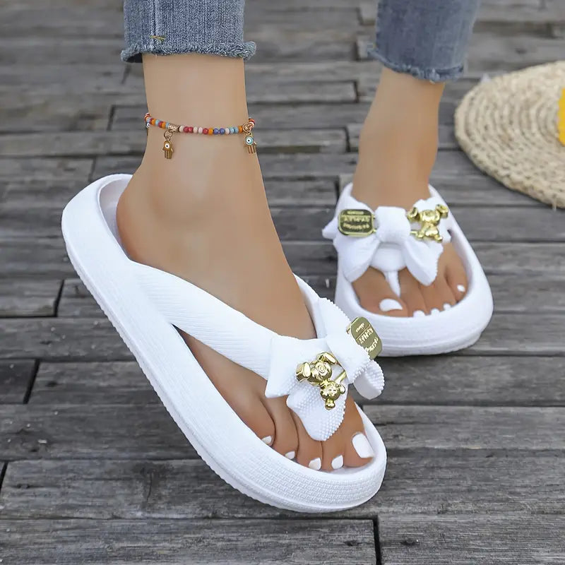 Anneliese – Platform Flip-flops with Bow and Gold Charm Detail