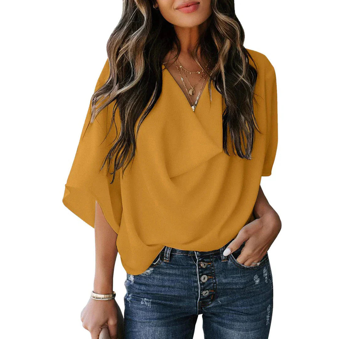 Raventha – Stylish Blouse with Batwing Sleeves
