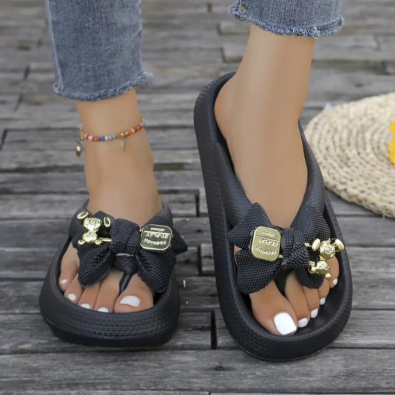 Anneliese – Platform Flip-flops with Bow and Gold Charm Detail