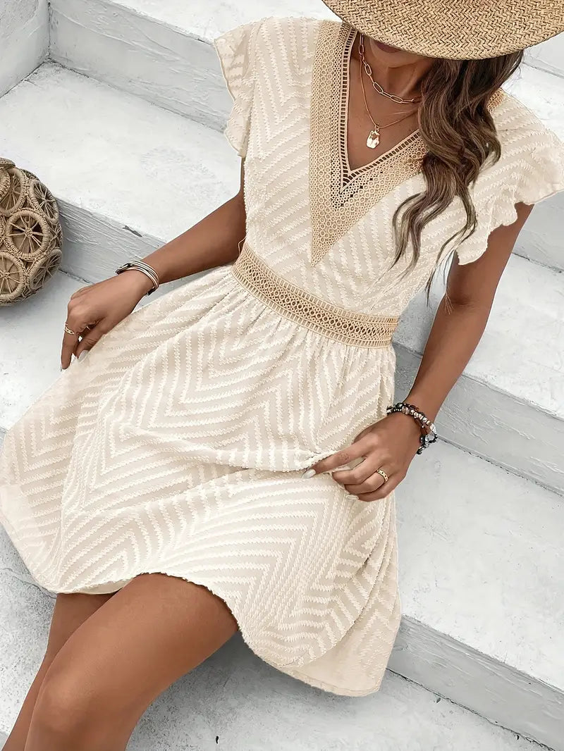 Yoshi – Boho V-neck Textured Mini Dress