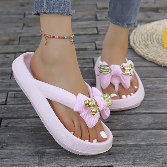 Anneliese – Platform Flip-flops with Bow and Gold Charm Detail