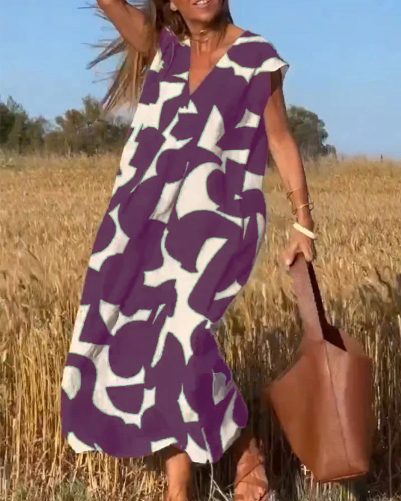 Goldie – Abstract Print Maxi Dress