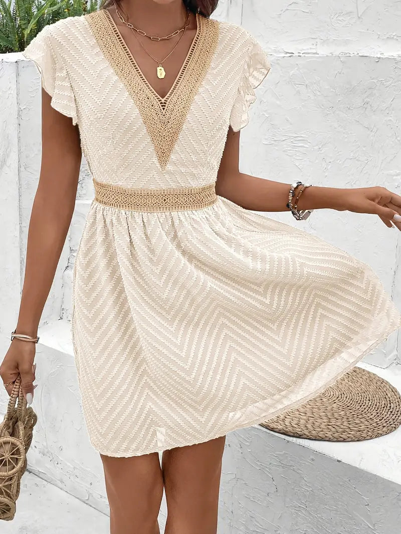 Yoshi – Boho V-neck Textured Mini Dress