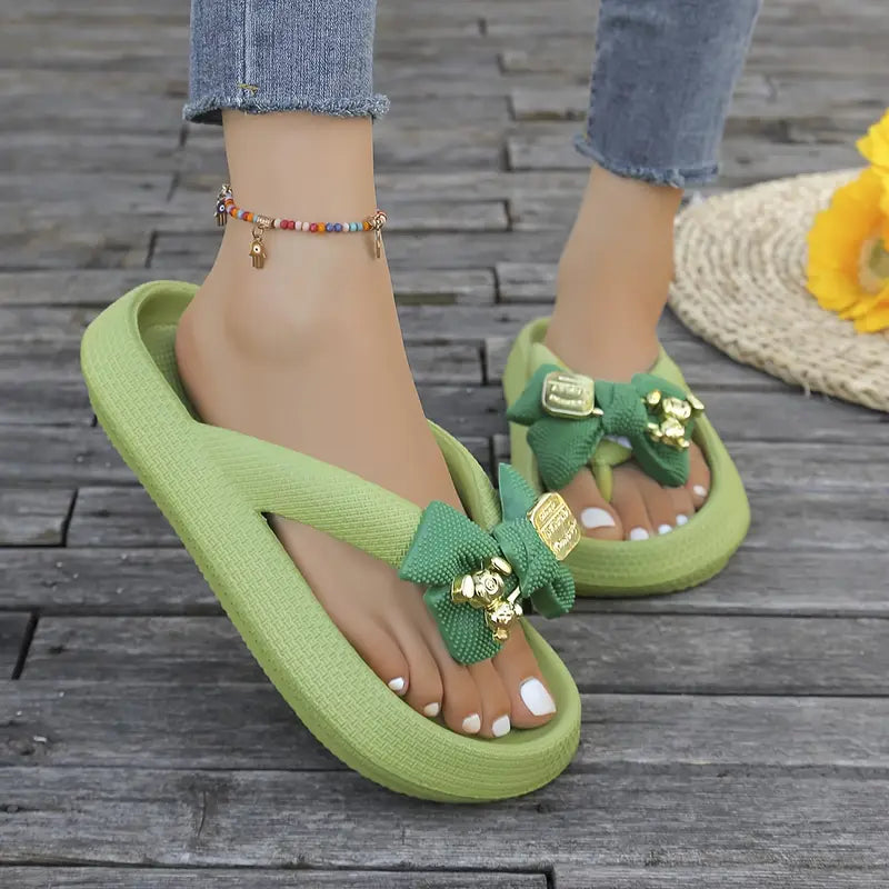 Anneliese – Platform Flip-flops with Bow and Gold Charm Detail
