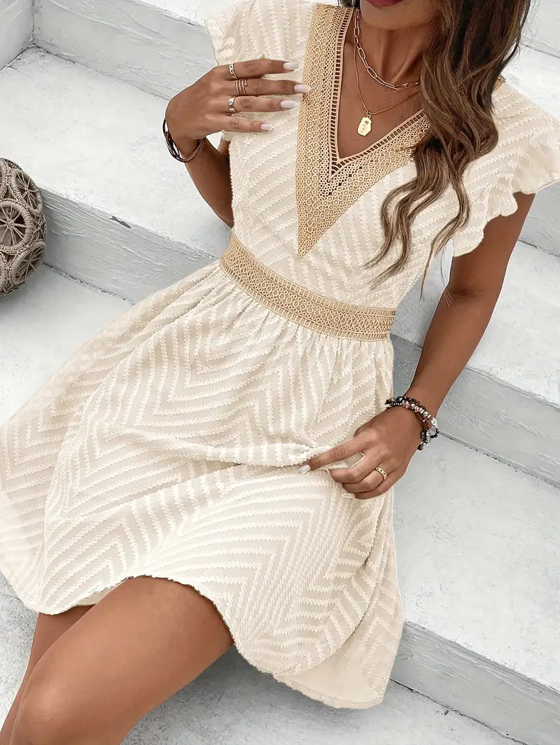 Yoshi – Boho V-neck Textured Mini Dress
