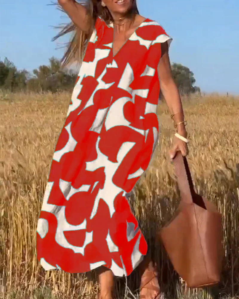 Goldie – Abstract Print Maxi Dress