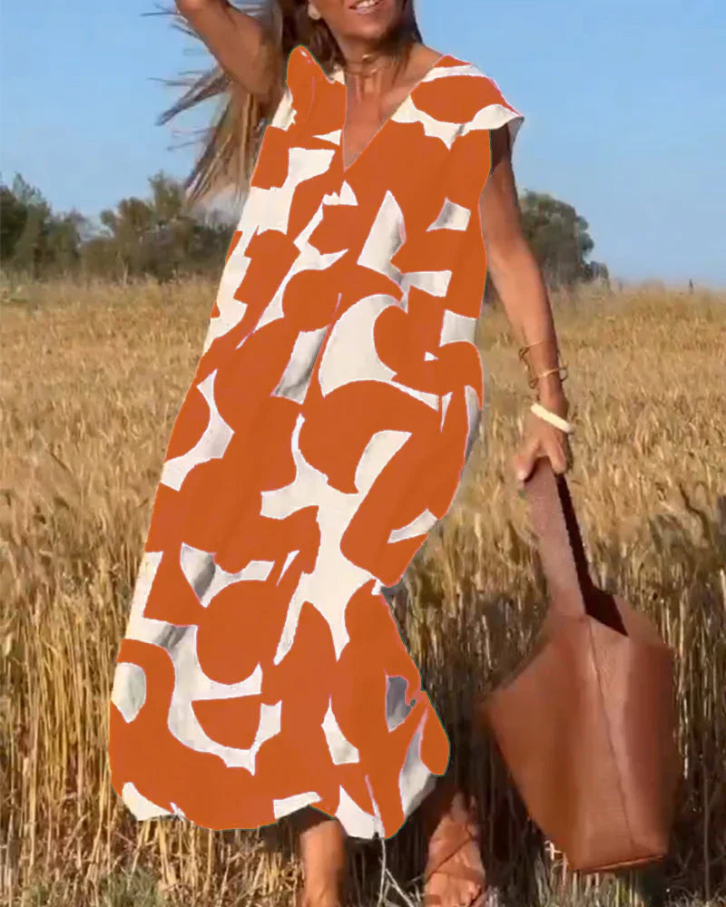 Goldie – Abstract Print Maxi Dress