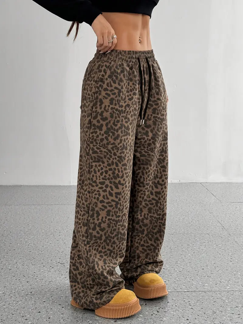Eryndra – Elegant Wide-leg Trousers with Leopard Print