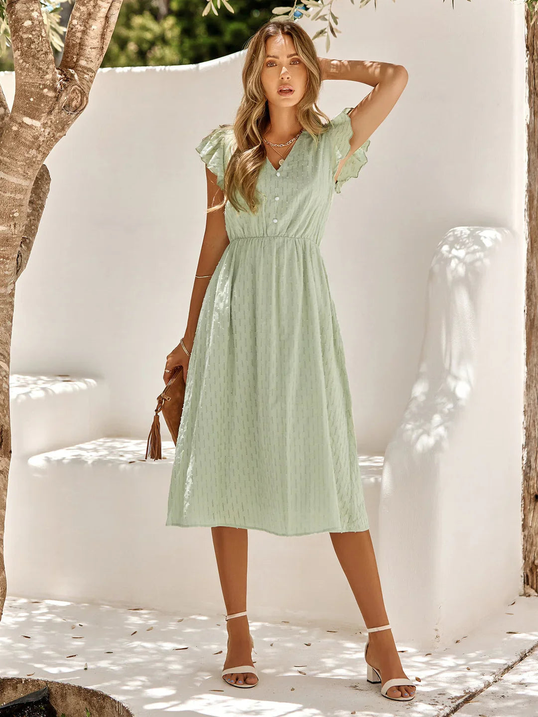 Iskaris – Elegant Cotton Flutter Sleeve Dress