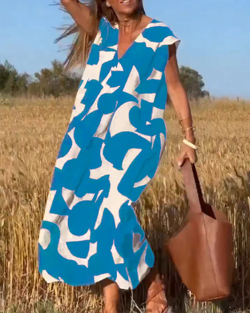 Goldie – Abstract Print Maxi Dress